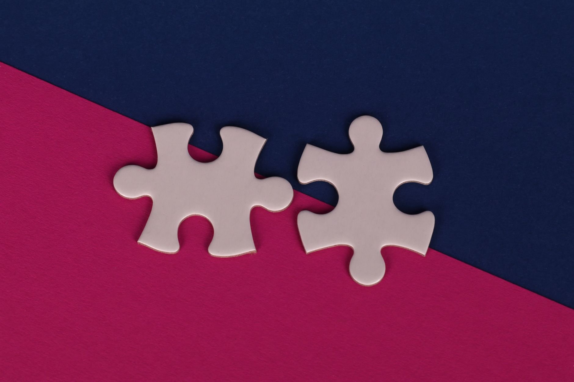 Colourful puzzle pieces on a bold background